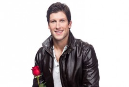 Bachelor Canada Brad Smith with a rose