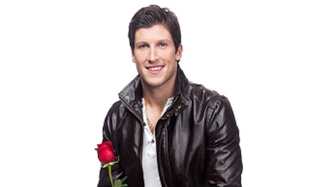 Bachelor Canada Brad Smith with a rose